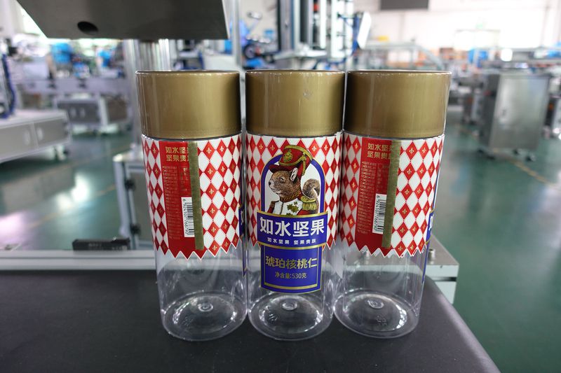 BK-302全自動(dòng)立式定位堅(jiān)果罐子圓瓶貼標(biāo)機(jī)